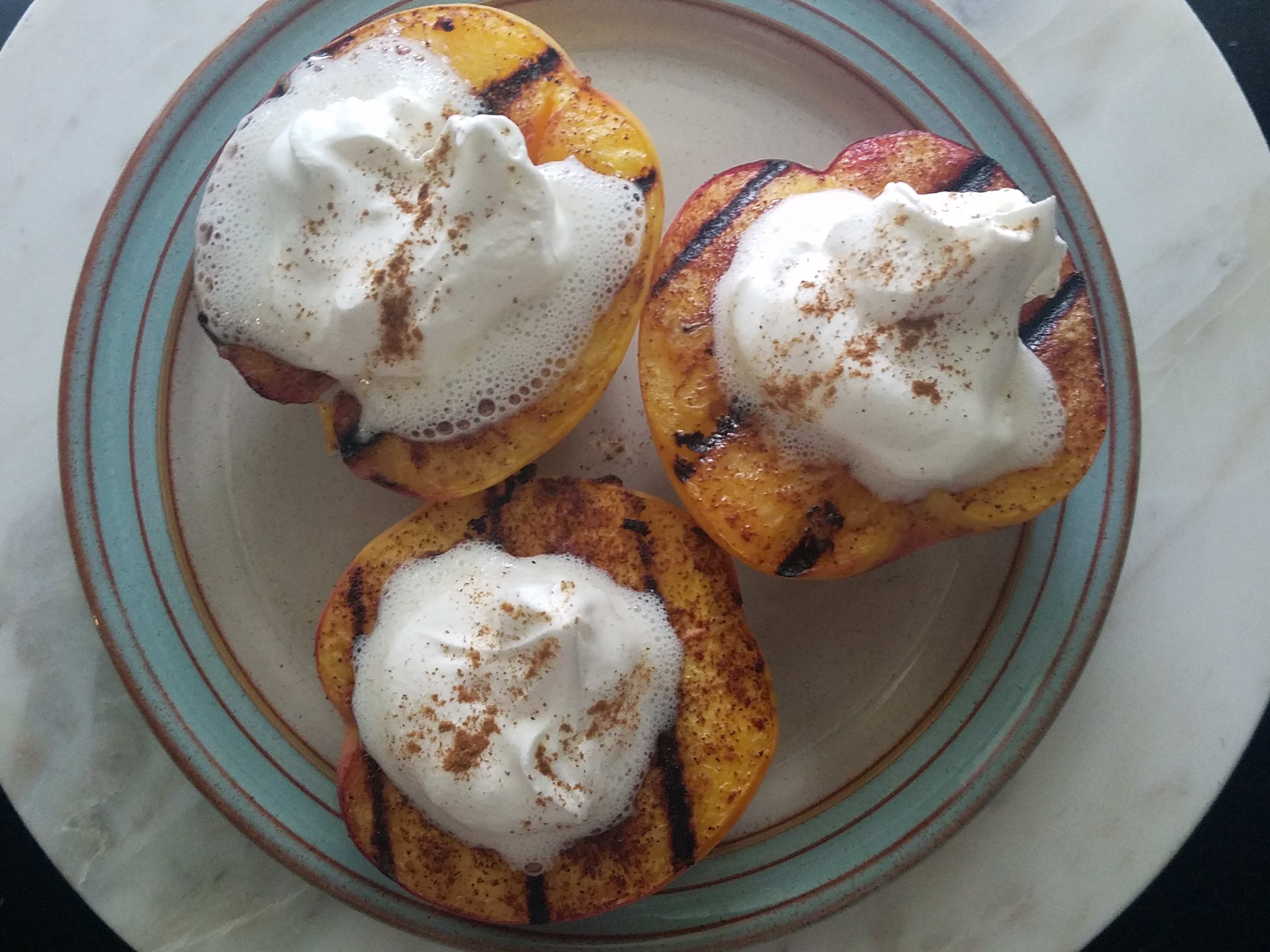 Grilled Peaches with Cinnamon and Cream