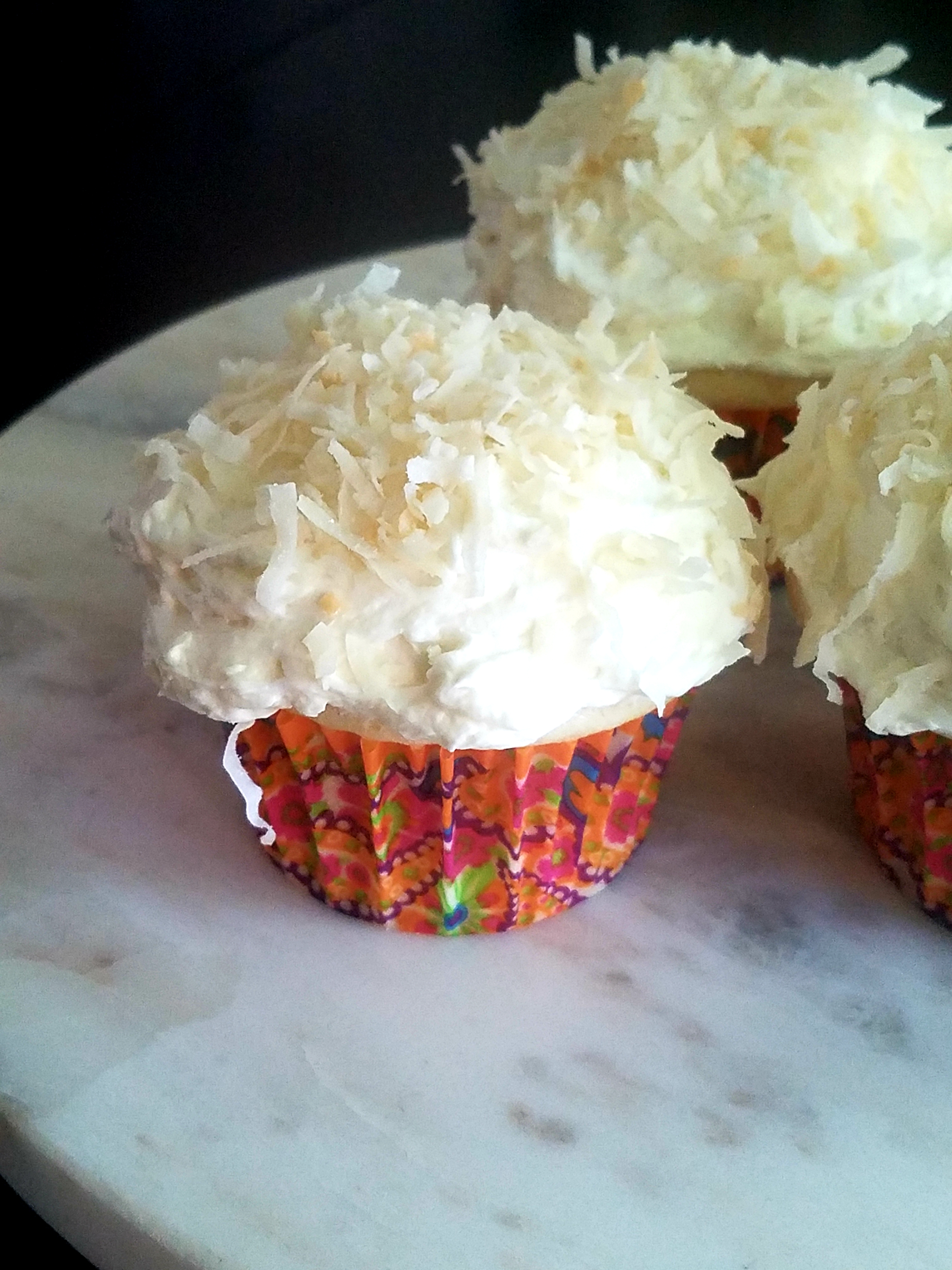 Coconut Cupcakes (Inspired by THE COINCIDENCE OF COCONUT CAKE)