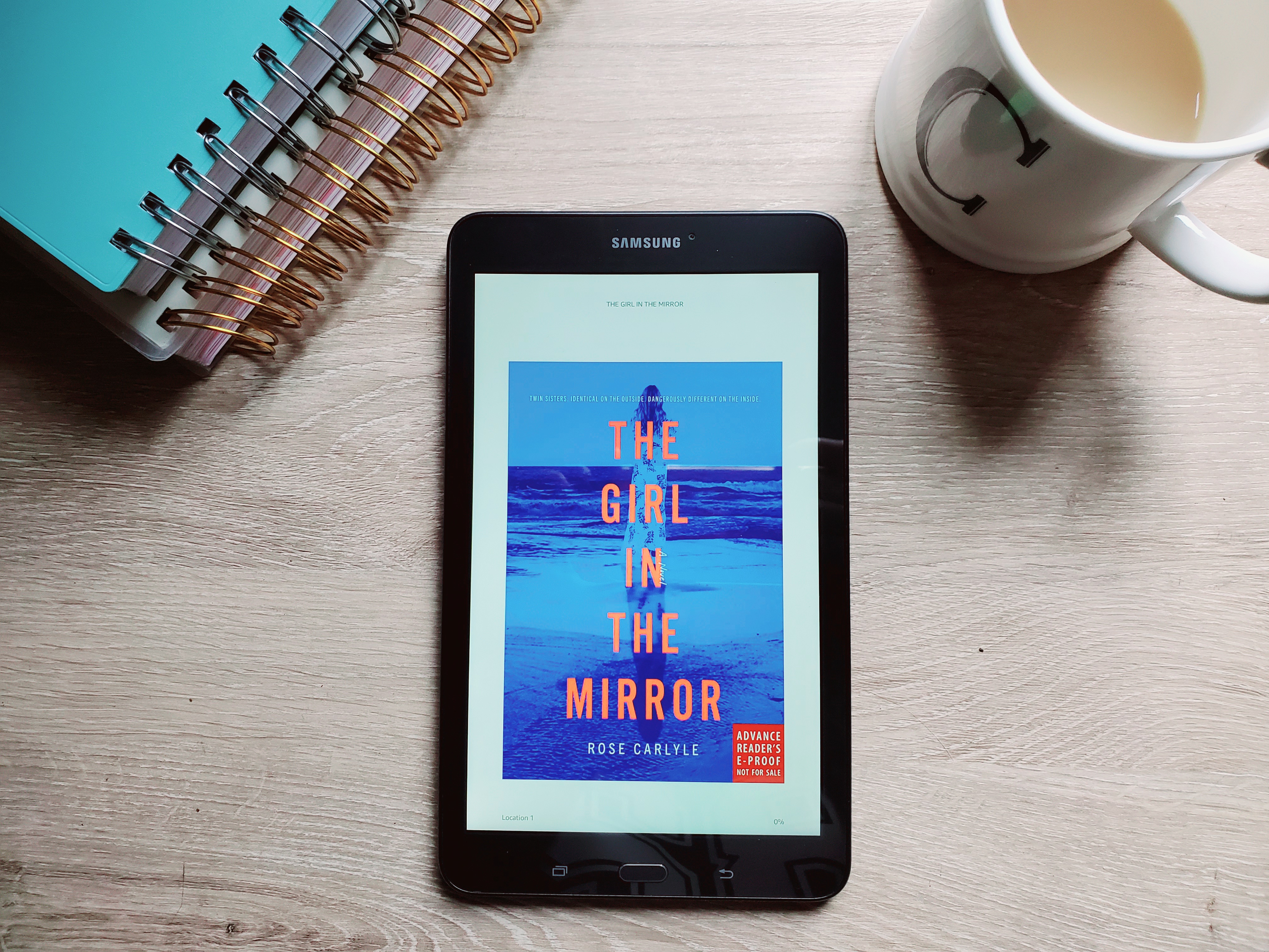 flatlay of the girl in the mirror book