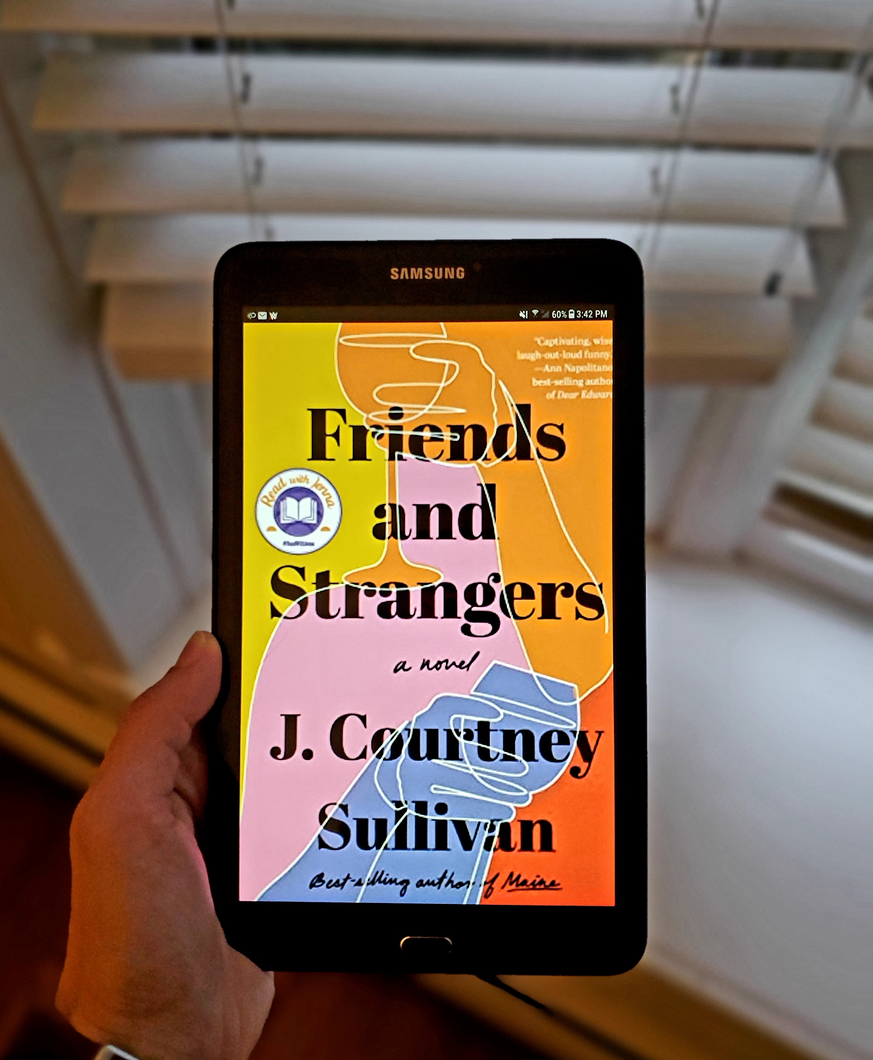 Friends and Strangers cover on tablet