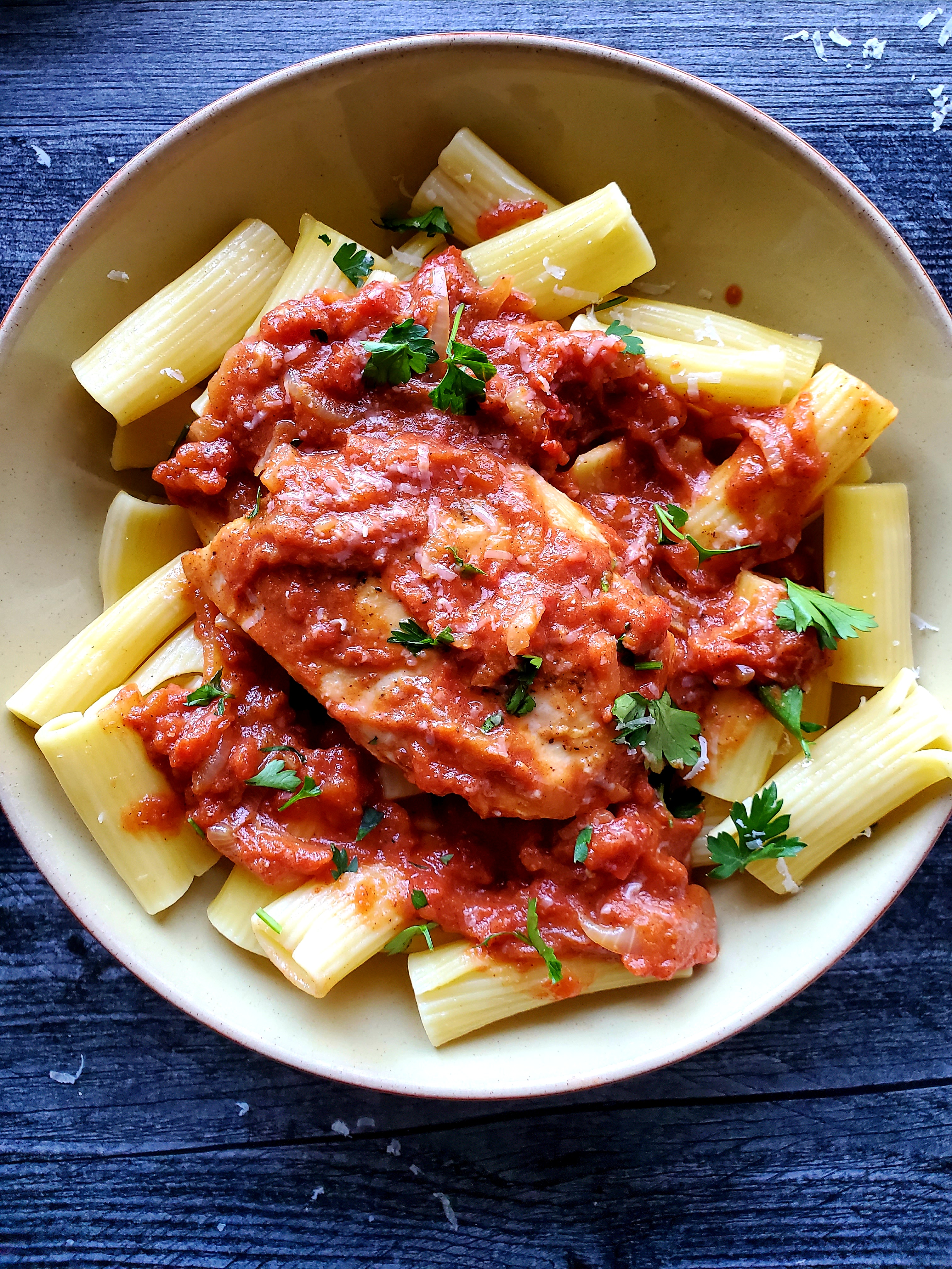 creamy tomato sauce over chicken and pasta