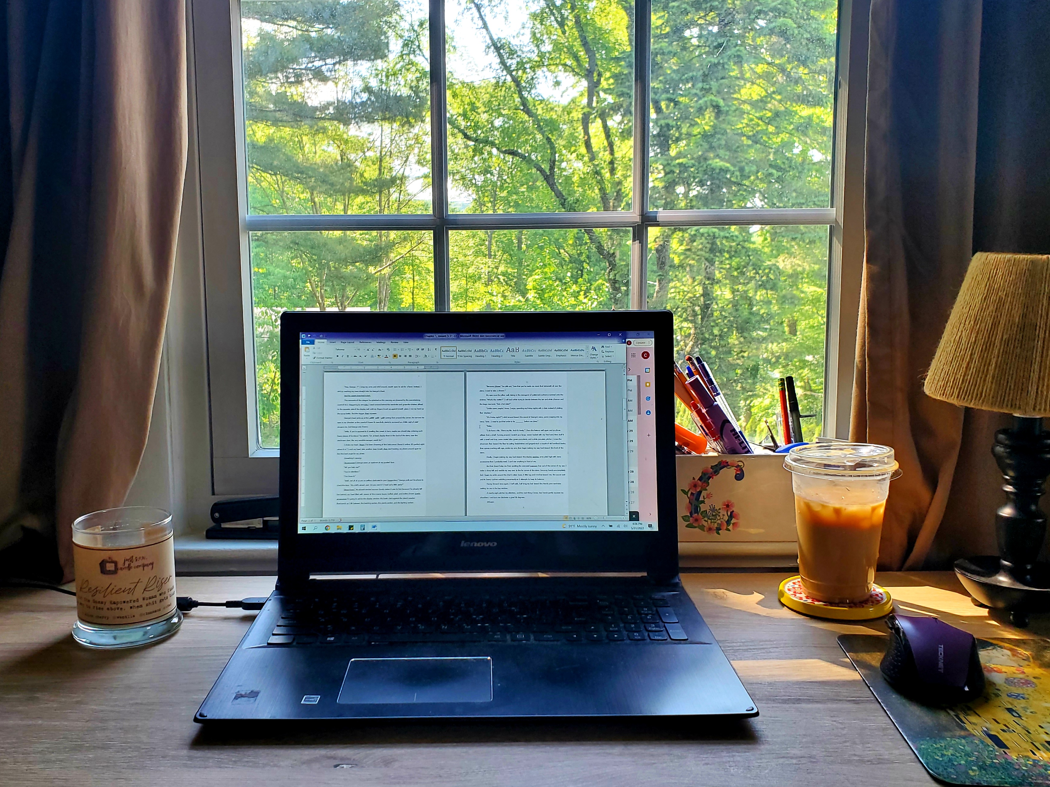 writing desk, iced coffee, laptop