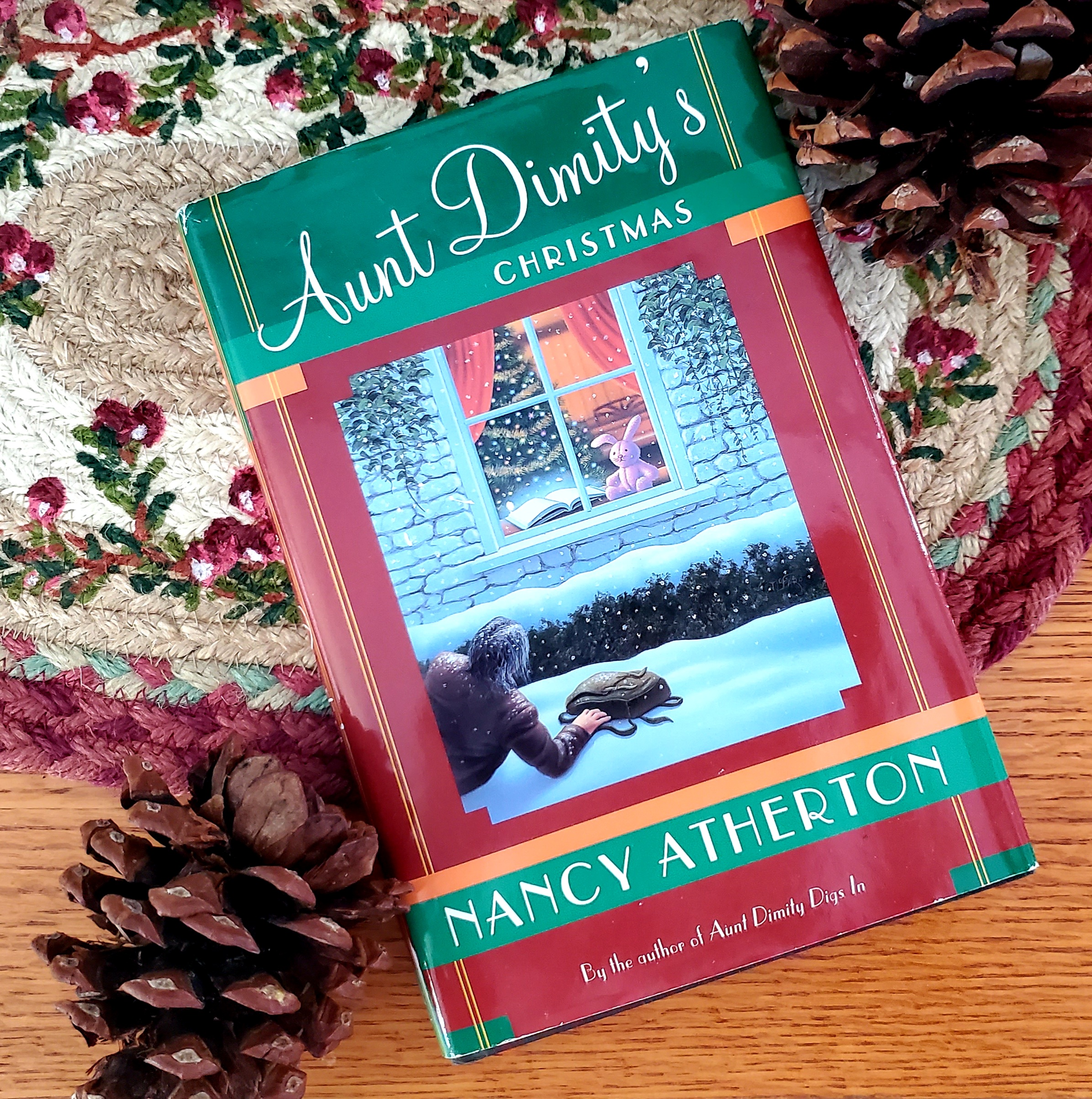 Aunt Dimity's Christmas book under the Christmas tree