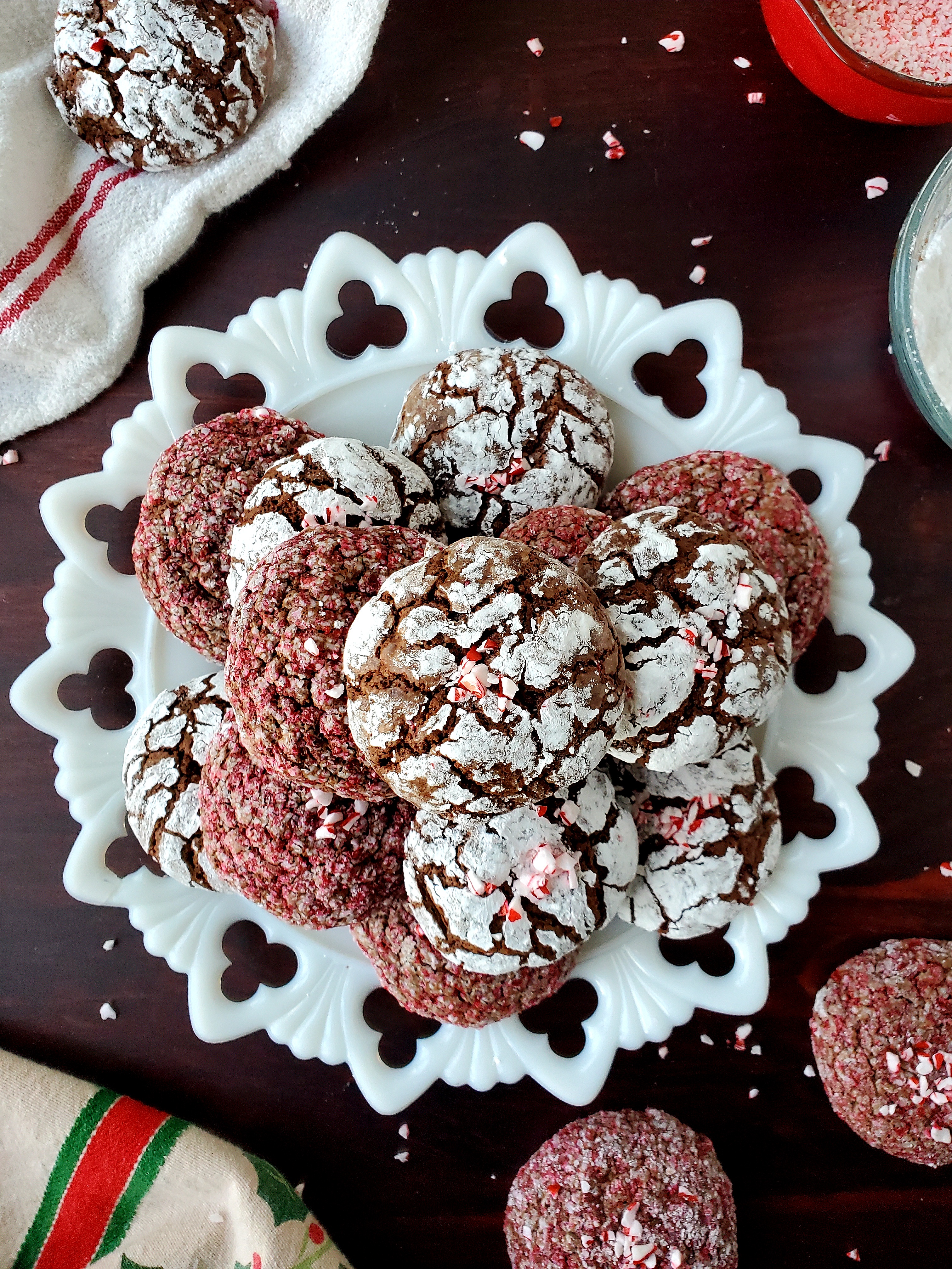 white milk glass plate with peppermint chocolate crinkle cookies