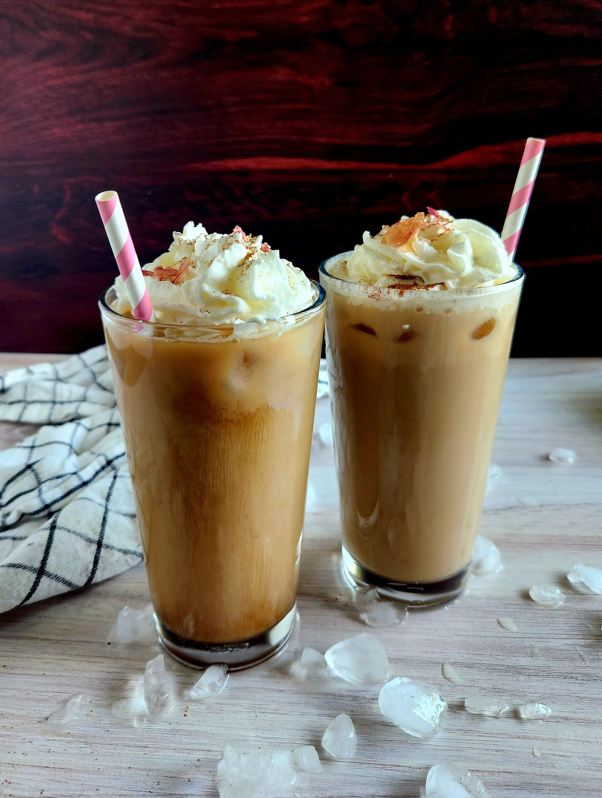 two glasses of iced dirty chai latte