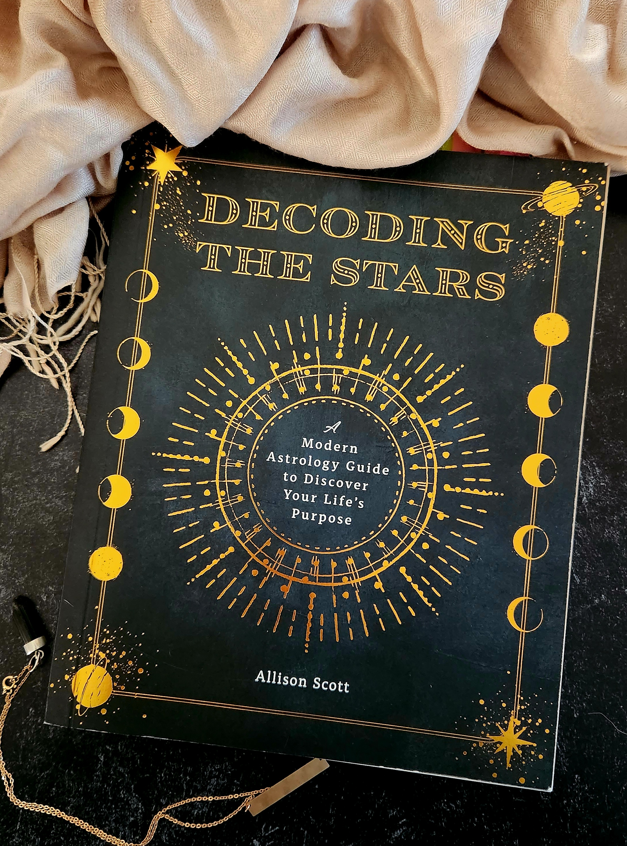 book cover of decoding the stars by allison scott