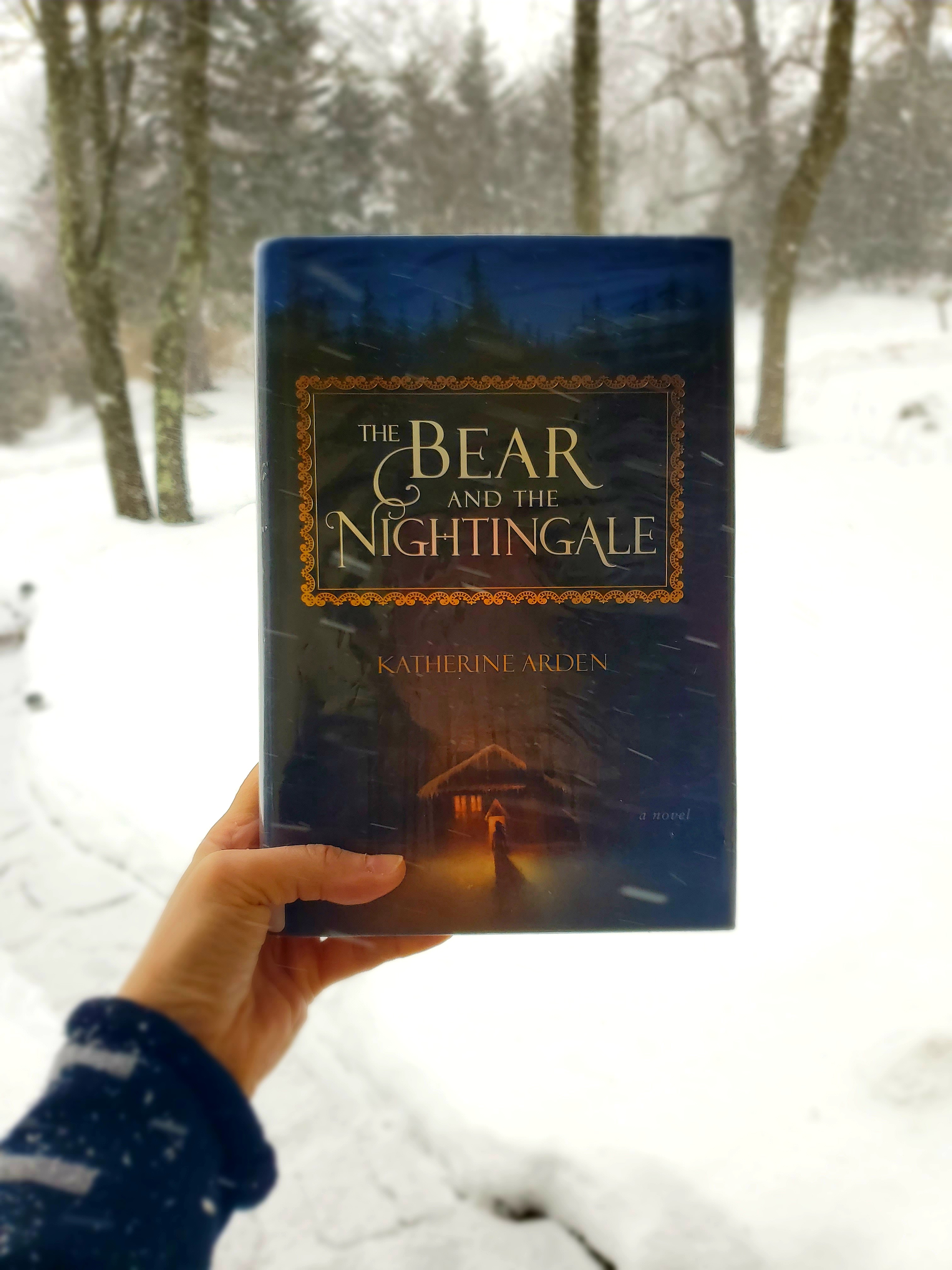 book cover of The Bear and the Nightgale in the snow